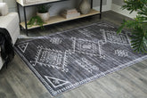 Prime Furniture - Ashley Furniture - Arloman Rug - 5' x 7' Washable Rug / Black/Cream/Gray - R405932